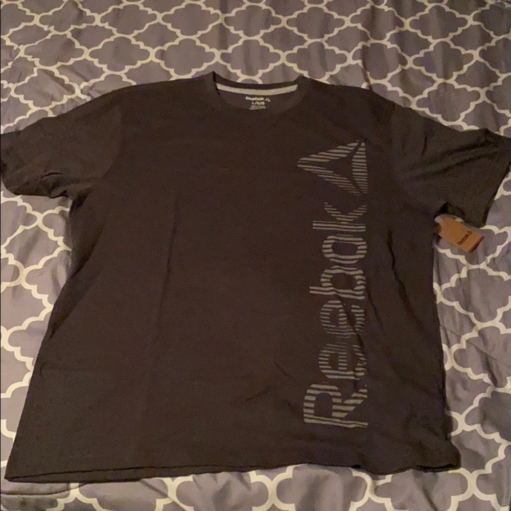 Reebok gray t shirt. New with tags. Never worn.